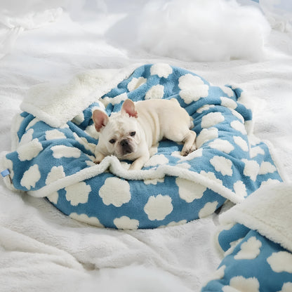 Blue and white patterned waterproof dog blanket on furniture showing cloth texture