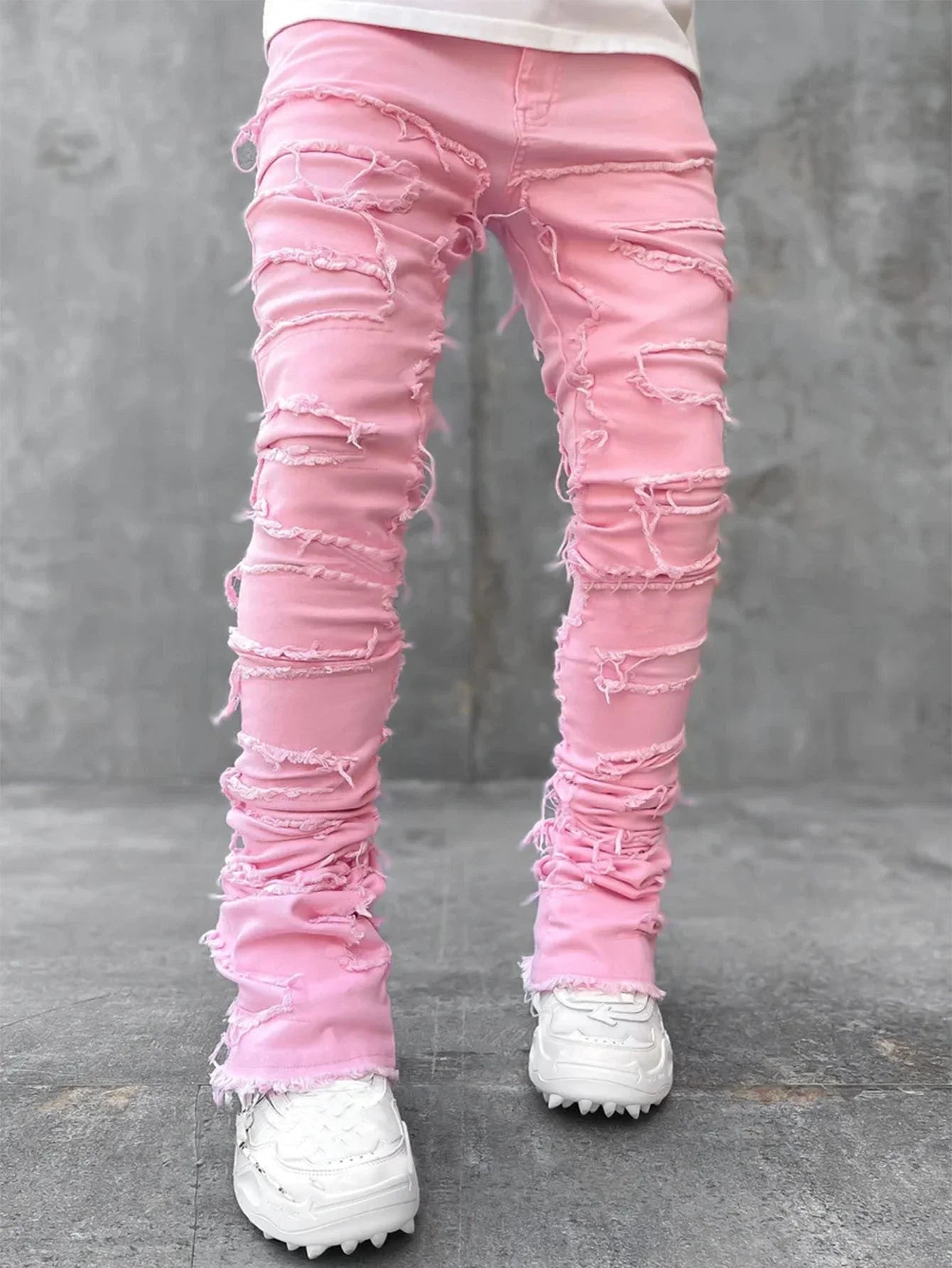Stylish patched men's jeans with tight, stacked fit and variety of vibrant color options