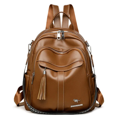 Genuine leather tassel backpack in khaki, black or brown with anti-theft pockets for casual travel