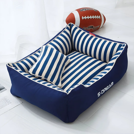 Navy striped removable dog kennel mat with a matching mini pillow, shown in blue and red colour options.