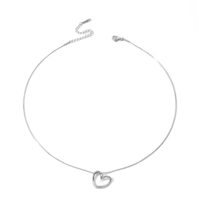 Stylish titanium steel heart pendant necklace with unique twist design, available in gold and silver colors