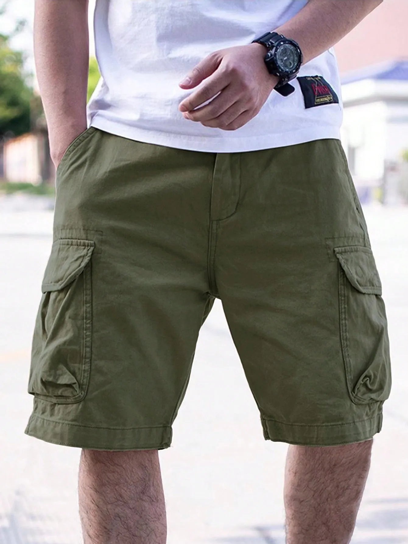 Men's loose-fit retro shorts in a cotton blend fabric, shown in army green colour.