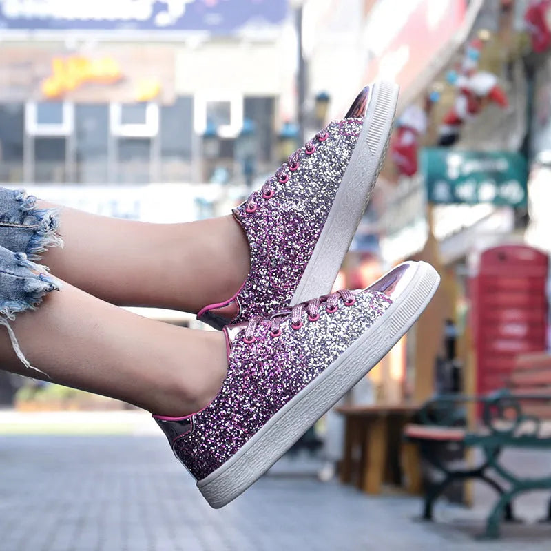 Women's colourful sequin casual low-top shoes in black, pink, and gold colours with lace-up front