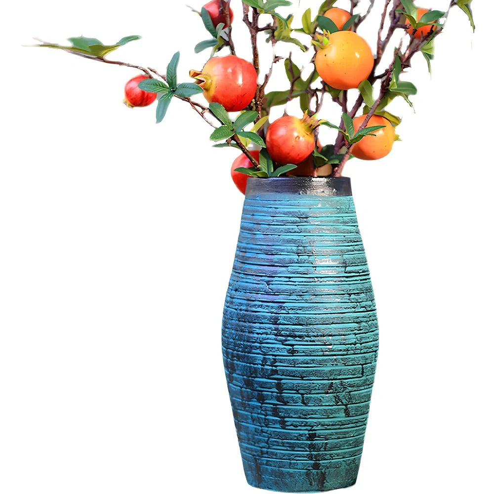 Ceramic mosaic vase with dried flowers, showing mosaic pattern and 25cm height