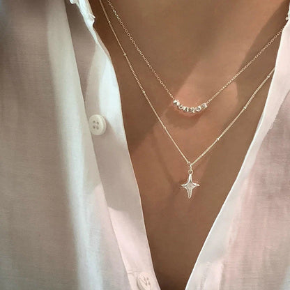 Elegant double-layer stainless steel cross necklace with opal accents