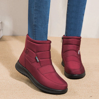Women's waterproof non-slip winter ankle boots in red, black, and brown