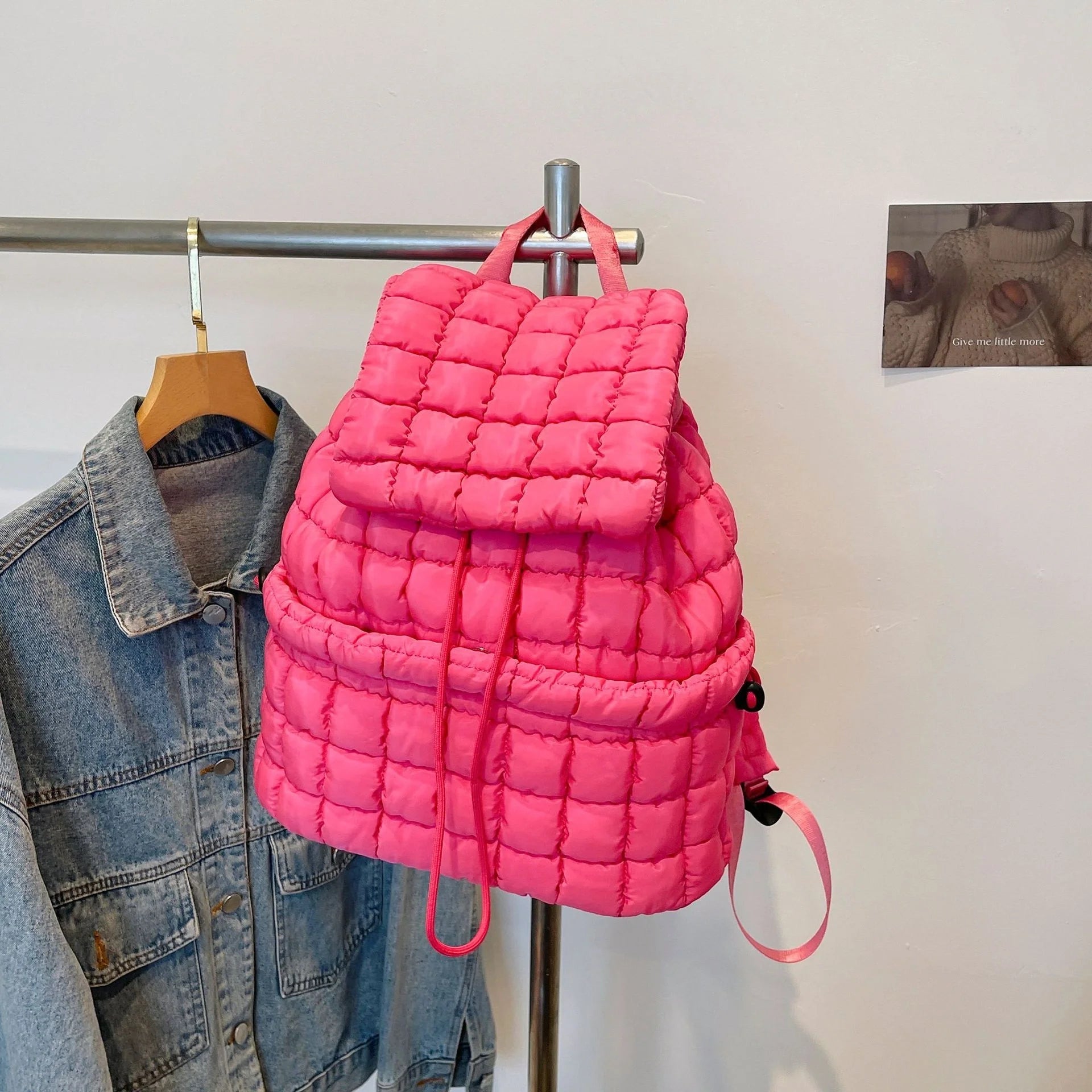 Soft, quilted puffer backpack in a variety of colors, perfect for autumn and winter wear