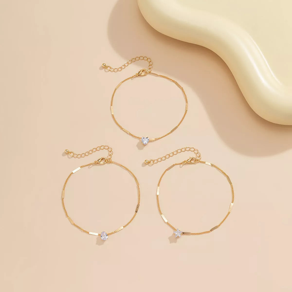 Beach Star Tassel Ankle Ring in gold and black, lightweight summer jewelry