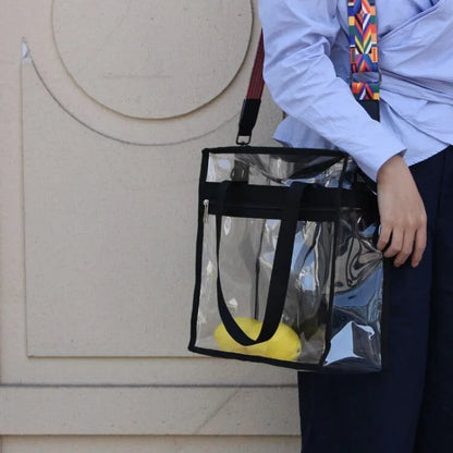 Women's PVC transparent shoulder messenger bag showing clear front panel with colour options and dual strap design