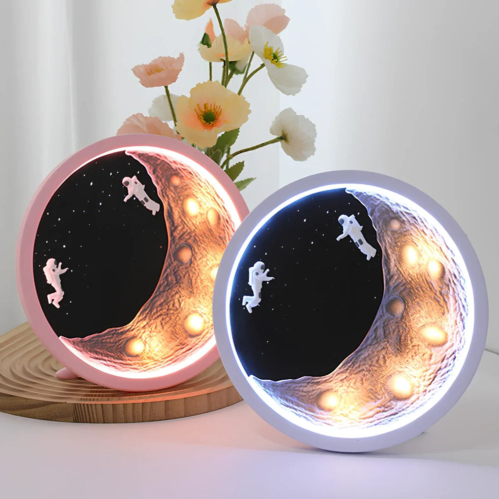 Moon Astronaut wireless Bluetooth speaker in white or pink with card insertion slot and USB port