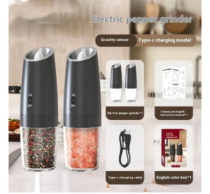 Modern electric gravity pepper grinder in matte black with adjustable ceramic mill and blue LED light on.