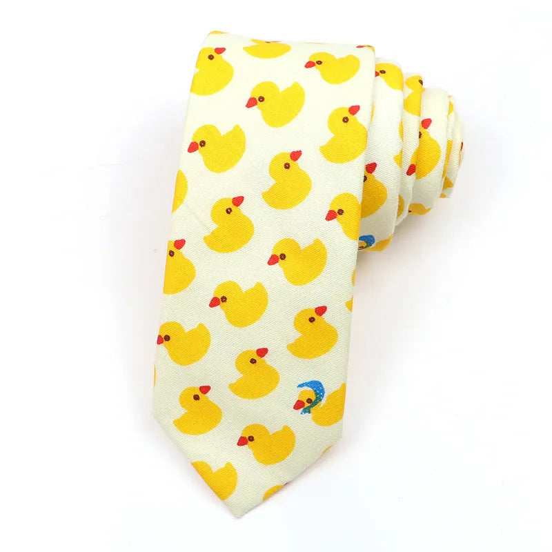 A narrow Korean-style cotton bow tie featuring a cartoon print, shown in a selection of colours.