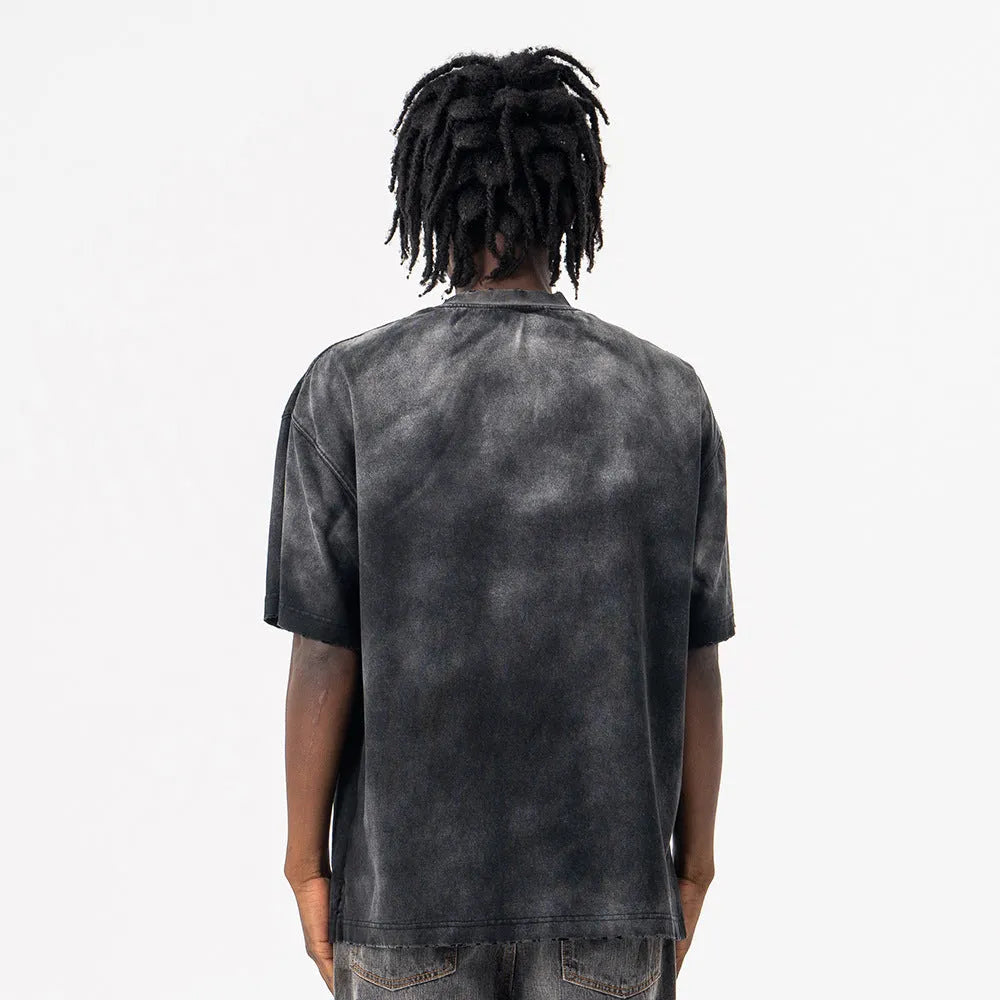 Black men's loose cotton t-shirt with printed letter pattern and drop-shoulder sleeves.