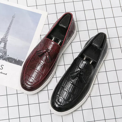 Men's business casual sneakers in black and wine red with leather-like finish and decorative tassels