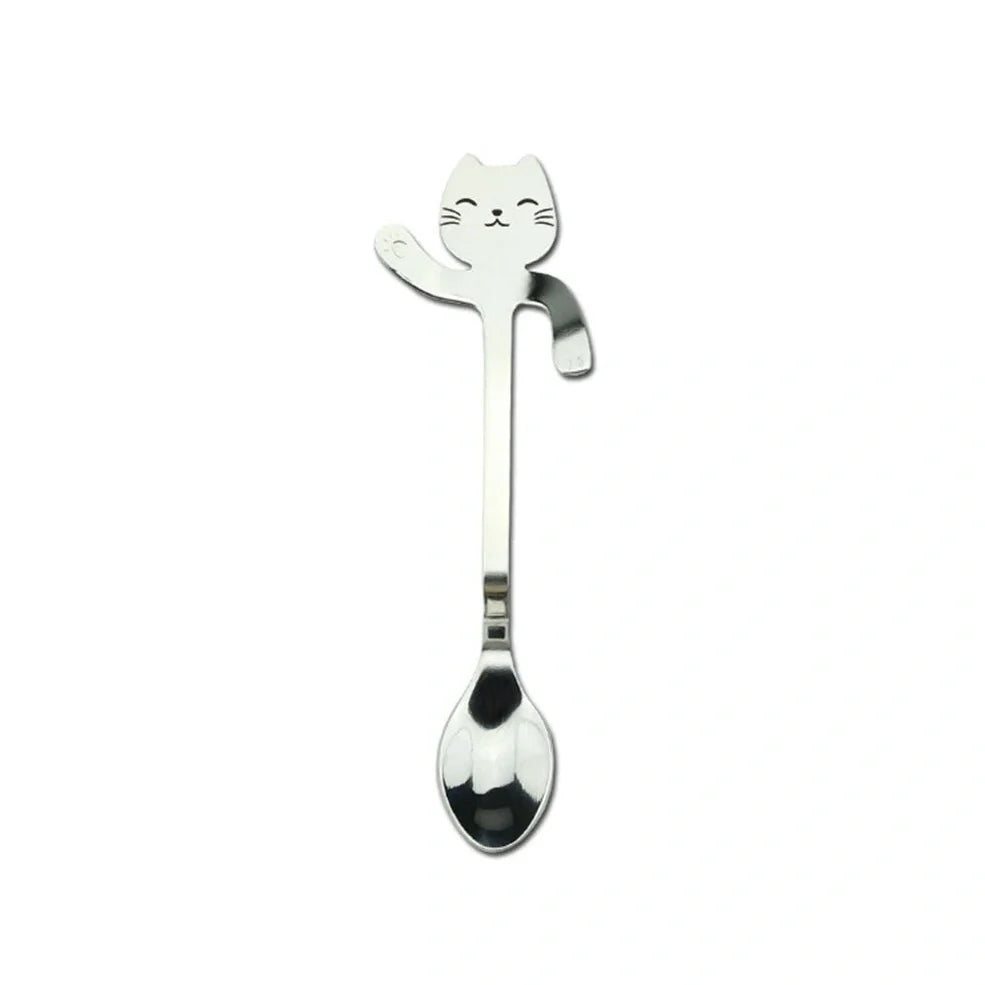 Stainless steel coffee spoon with cartoon cat handle design showing 11.7cm measurement scale