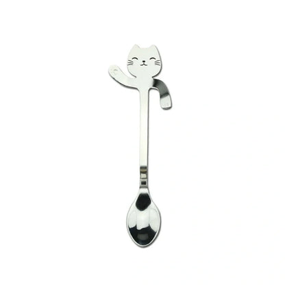 Stainless steel coffee spoon with cartoon cat handle design showing 11.7cm measurement scale
