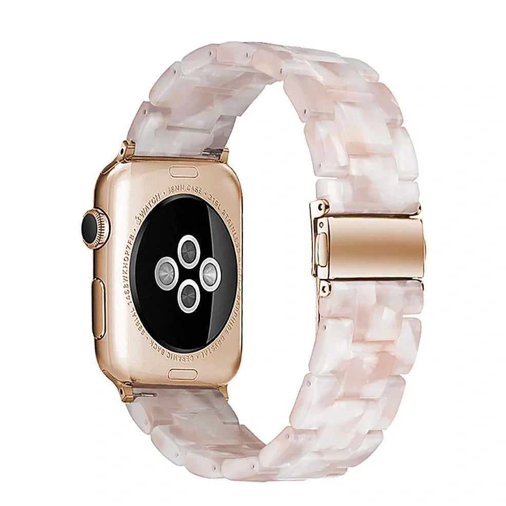 Slim resin Apple Watch strap showing attachment mechanism and colour options