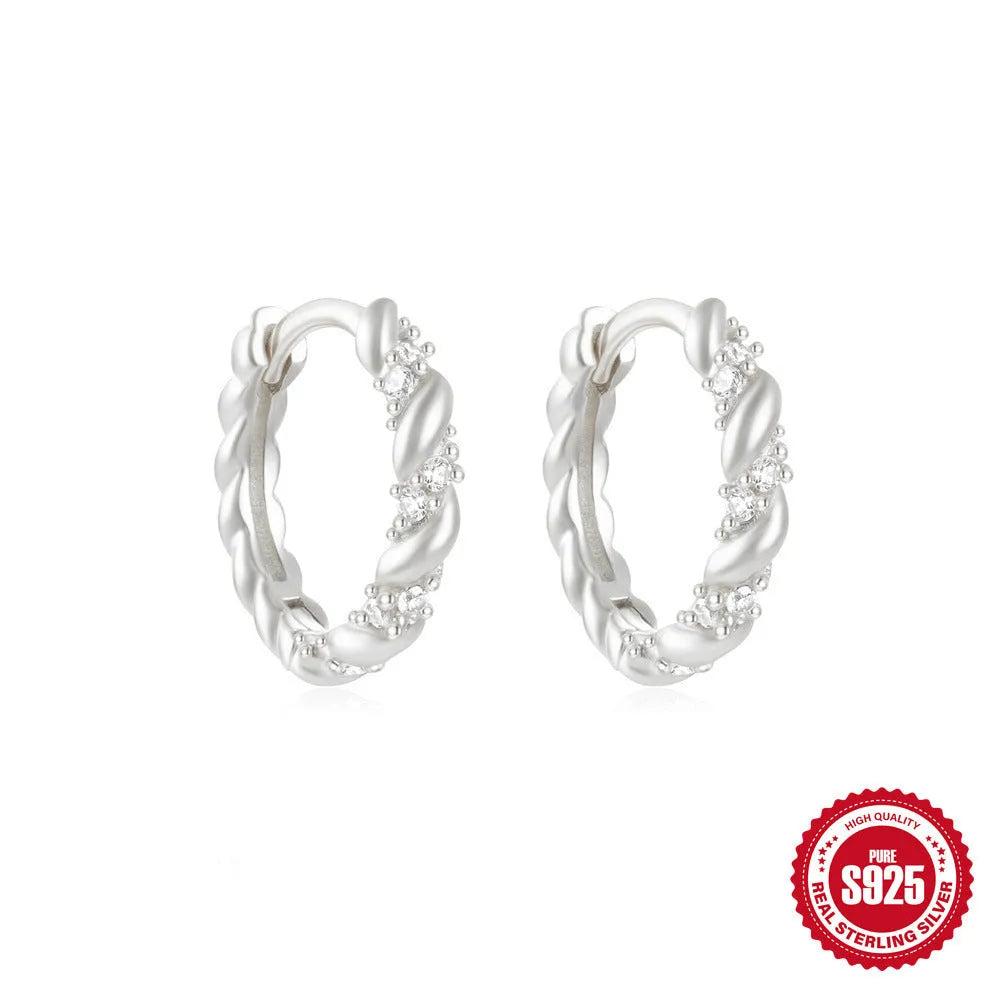 Sterling silver geometric stud earrings with small round diamond accents in gold or silver finish