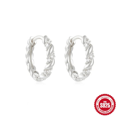 Sterling silver geometric stud earrings with small round diamond accents in gold or silver finish