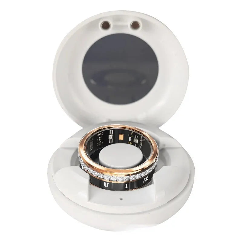 Gold and silver diamond-inlaid smart ring for blood oxygen monitoring on a finger.