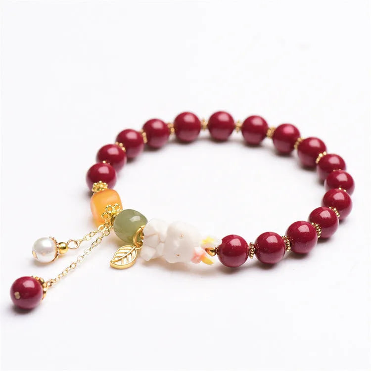 Natural cinnabar rabbit bracelet in beeswax purple and gold sand, national style, shown in 8mm and 10mm sizes.