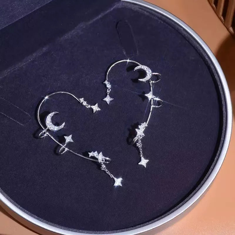 Moon Splash Star River no-pierce ear clips with heart-shaped design and artificial gemstones
