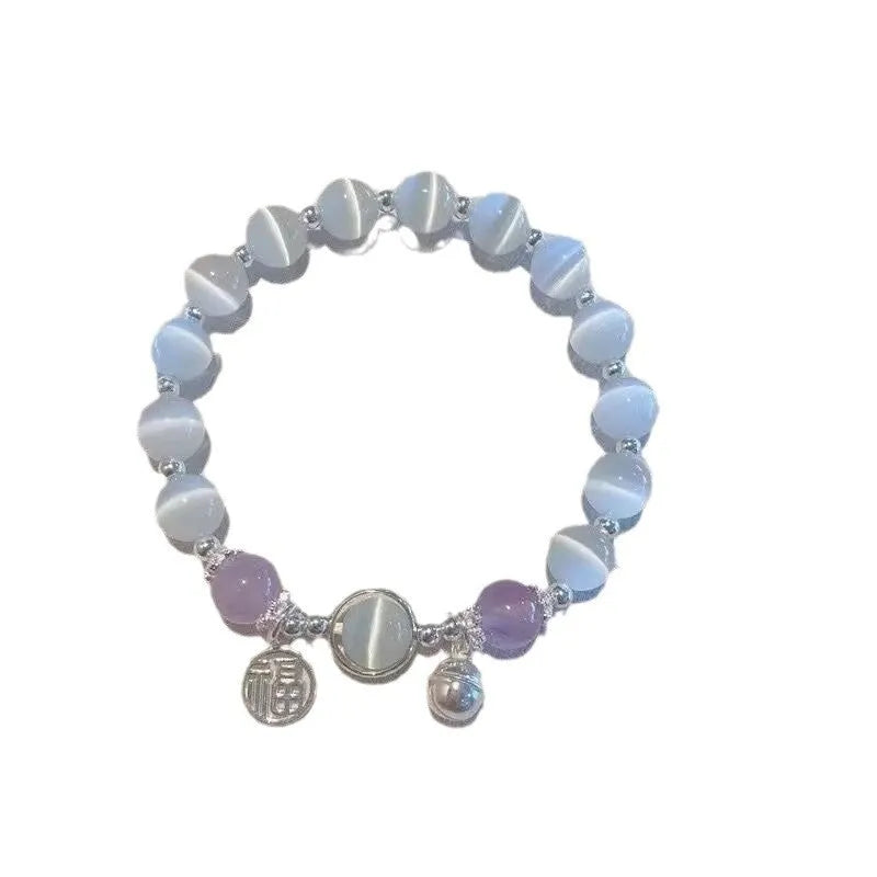 Handmade glass butterfly bracelet with drop-shaped beads in moonlight grey colour variation