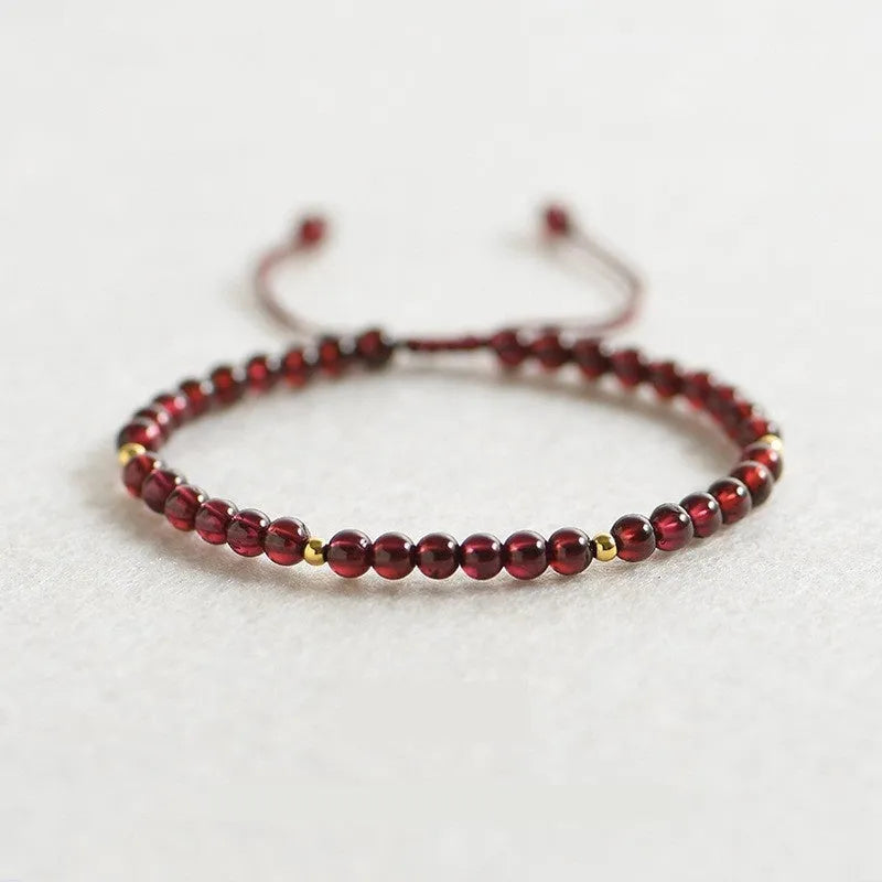 Women's freshwater pearl bracelet with stainless steel magnetic clasp on clear elastic cord