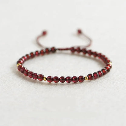 Women's freshwater pearl bracelet with stainless steel magnetic clasp on clear elastic cord