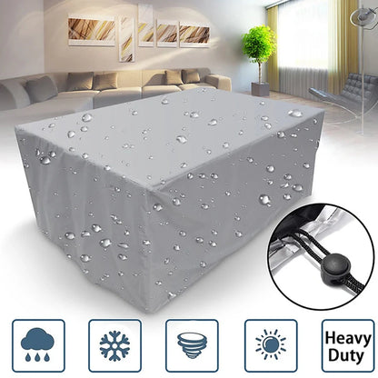 Waterproof furniture cover protecting outdoor table and chairs from rain with integrated storage bag