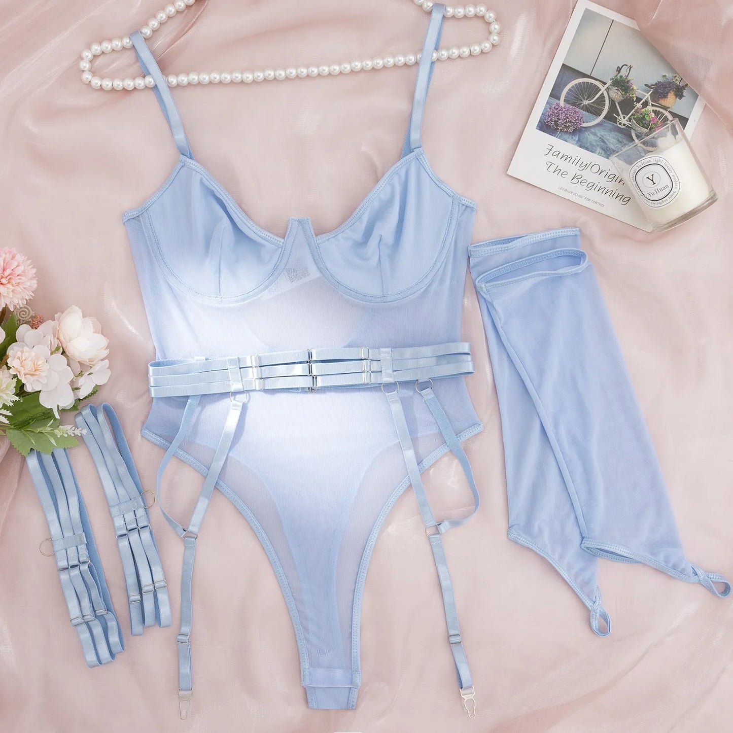 See-through jumpsuit with mesh panels in various colours including black, red, and light blue, sizes S, M, L for female wearers.