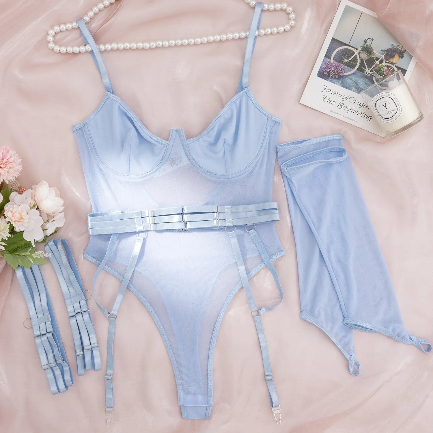 See-through jumpsuit with mesh panels in various colours including black, red, and light blue, sizes S, M, L for female wearers.