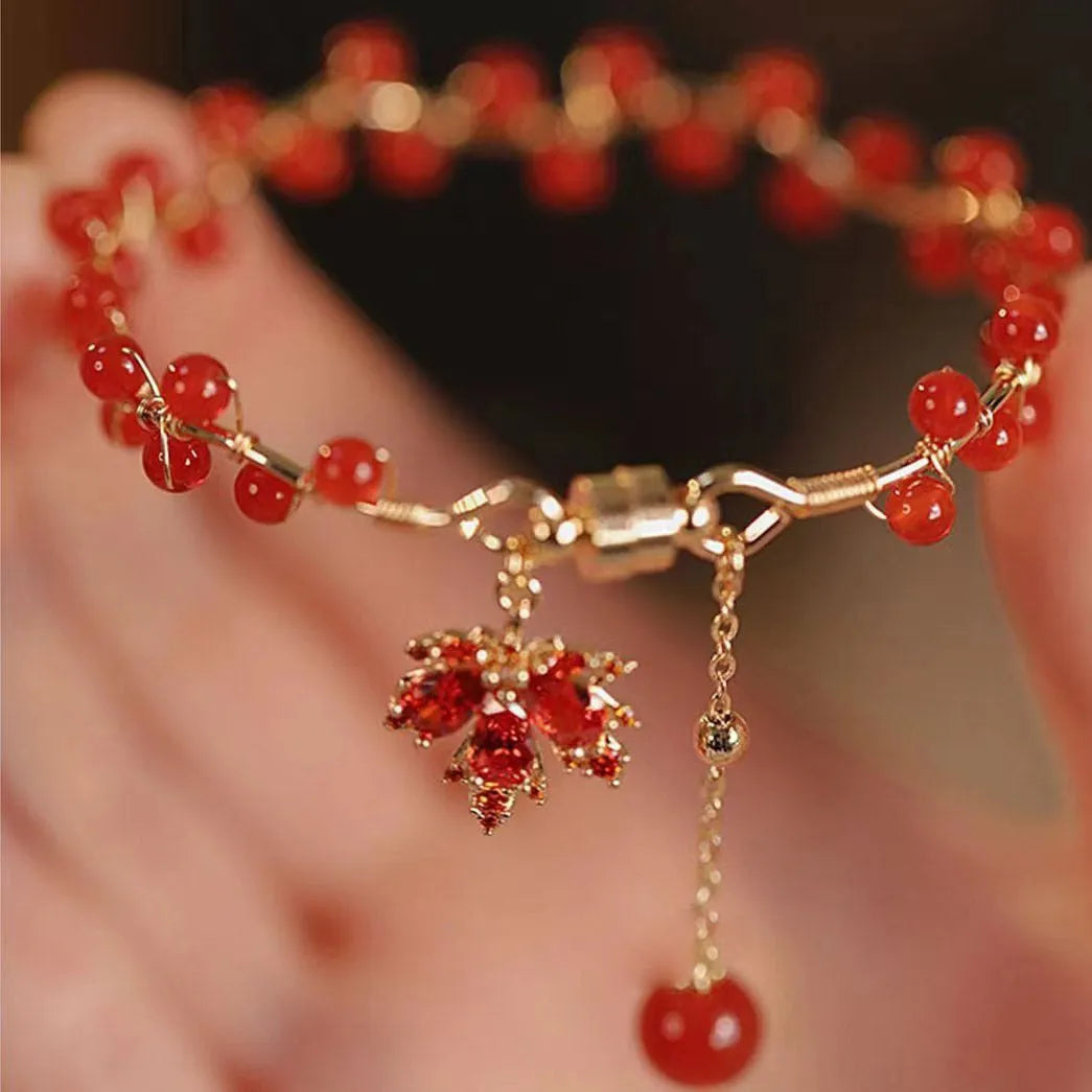 Red ginkgo leaf charm on an alloy magnetic bracelet with a natural Chinese style.