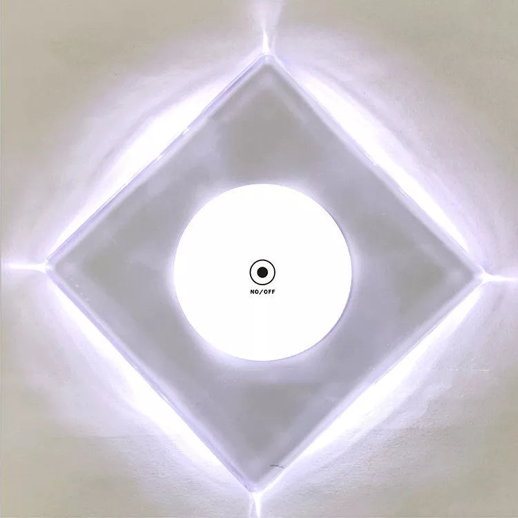 LED Glow Coaster with vibrant colors illuminating a cocktail glass