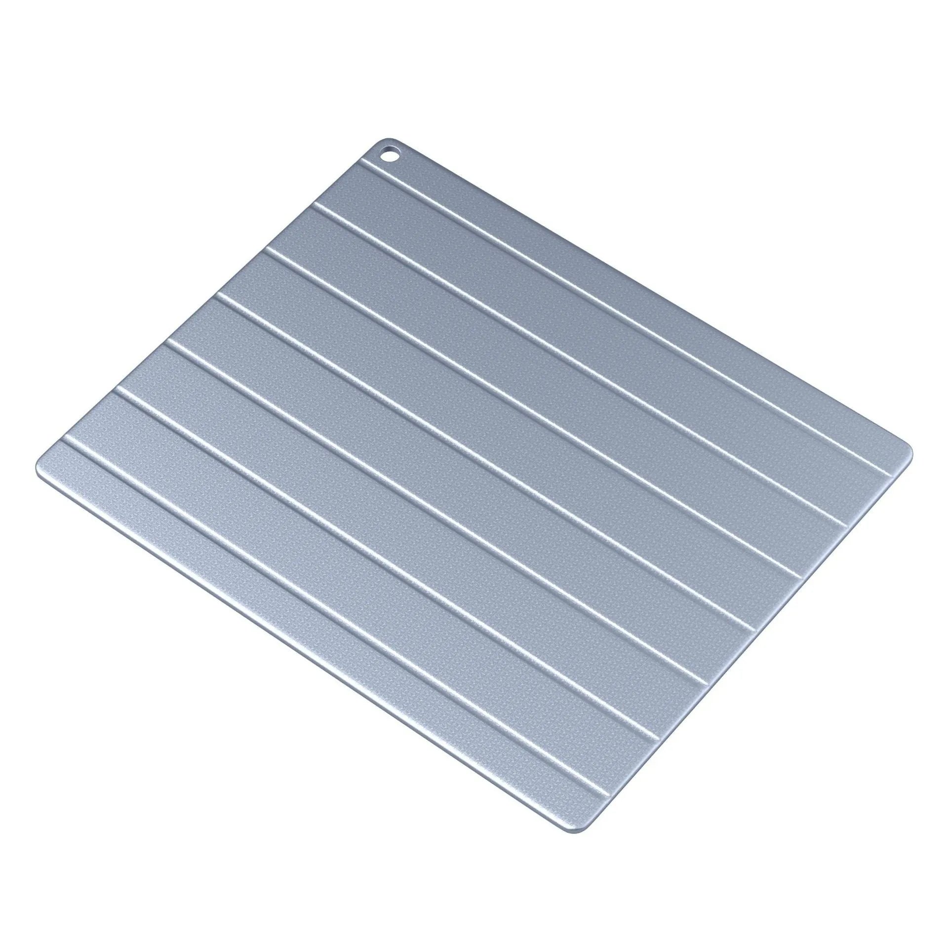 A modern simple style aluminium quick defrosting plate for household kitchen use.