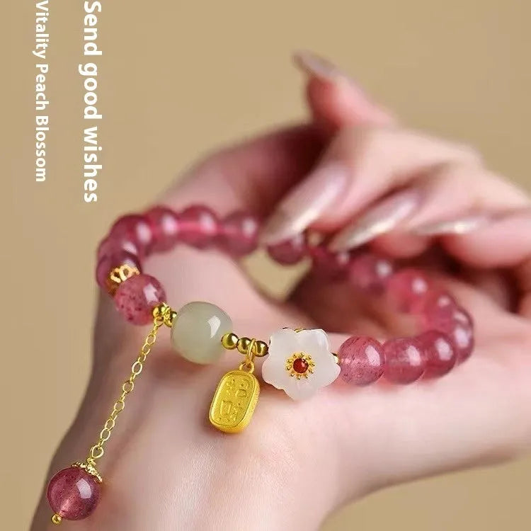 Hetian jade peach blossom strawberry quartz crystal bracelet for girls - handcrafted natural crystal jewellery with adjustable string closure in strawberry quartz designs including pearl, moon and XINGX styles
