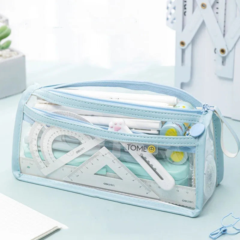 Double-layer transparent pencil case in large capacity exam-friendly size 220x110x80mm, with blue, pink, purple, or beige colour options and optional cartoon stickers.