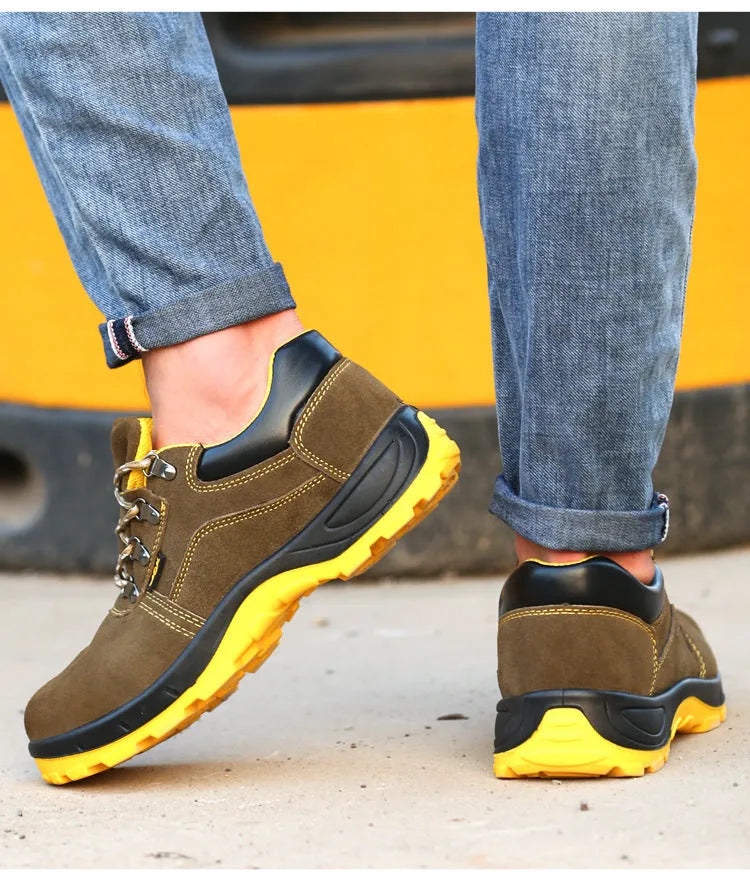 Bronze low-cut leather safety shoes with steel toe cap and patterned non-slip rubber sole.