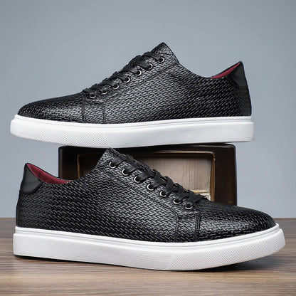 Men's black low-top business shoe with artificial PU leather upper and rubber sole.
