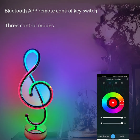 Black musical note-shaped Bluetooth lamp with app control and RGB lighting.