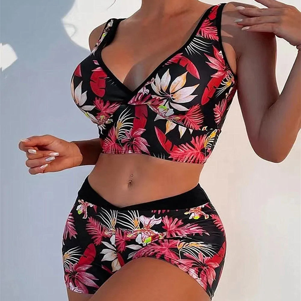 Women's two-piece printed swimsuit set with boxer-style briefs and sleeveless top in multi-colour pattern