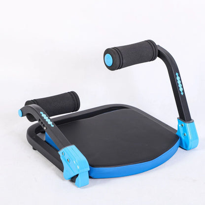 Compact sky blue abdominal roller with textured handles on a wooden floor, showing its 38cm length.