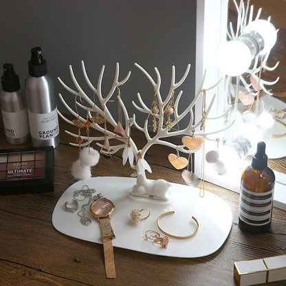 Deer Antler Jewelry Stand in white and black, organizing earrings, necklaces, and bracelets
