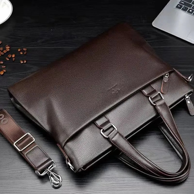 Men's black and brown PU leather shoulder messenger bag with splicing design, shown with crossbody strap.