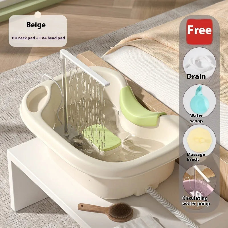 Portable plastic shampoo basin with neck pillow and water pump for bed hair washing.