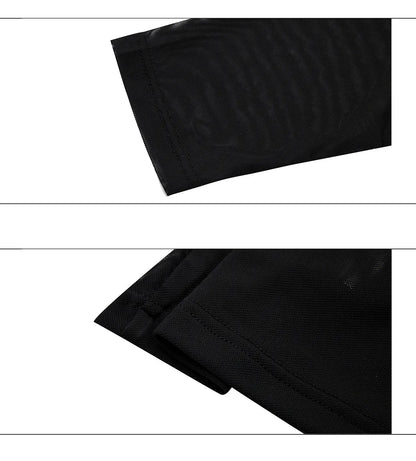 Man wearing a black slim-fit niche mesh long sleeve base layer shirt.