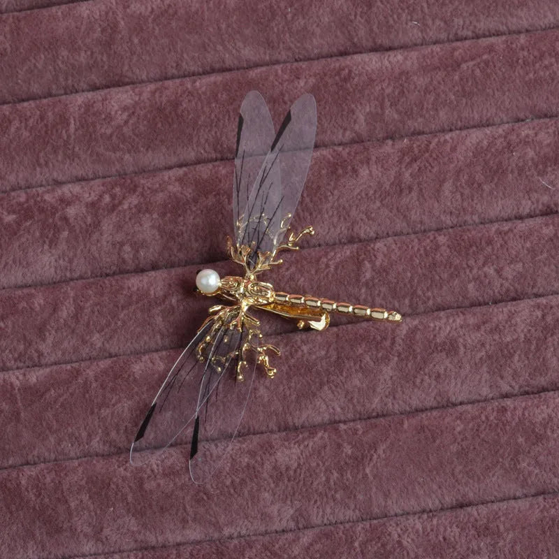 Golden dragonfly side clip headdress with detailed insect design and electroplated alloy construction