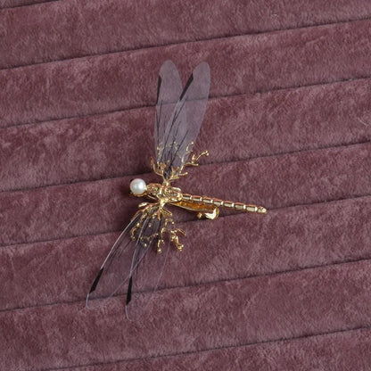 Golden dragonfly side clip headdress with detailed insect design and electroplated alloy construction