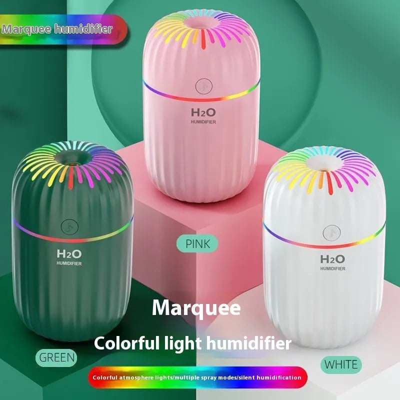 Mini USB aromatherapy humidifier in green, pink or white with 75x75x116mm dimensions and 0.5L water tank