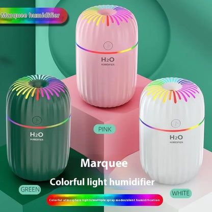 Mini USB aromatherapy humidifier in green, pink or white with 75x75x116mm dimensions and 0.5L water tank